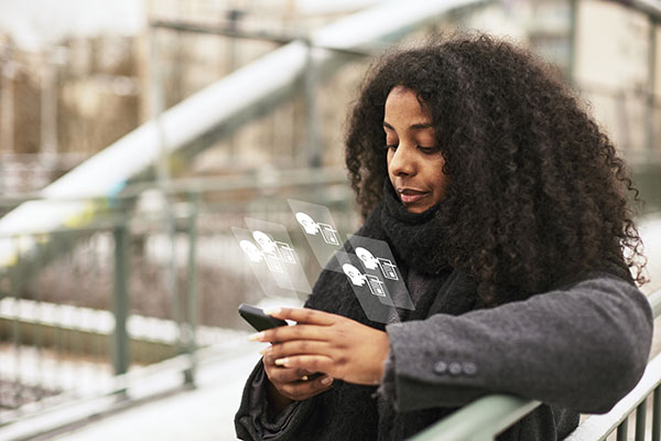 woman-reading-fake-news-on-cell-phone